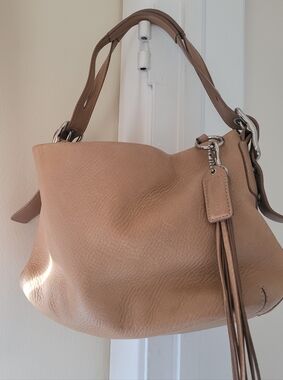 Coach Legacy East West Shoulder Bag Leather with Tassel Caramel Color.